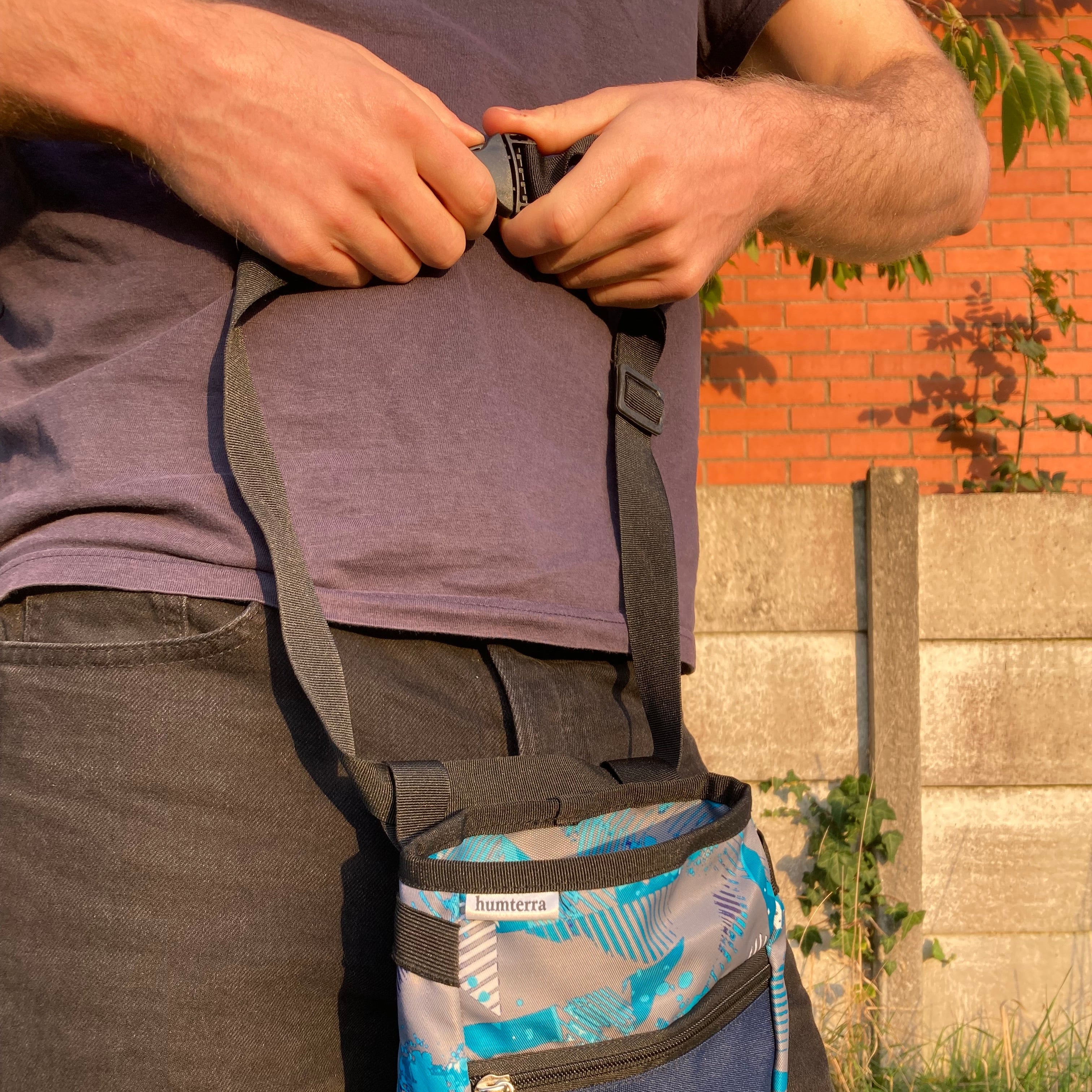 Chalk Bag waist band is being clipped